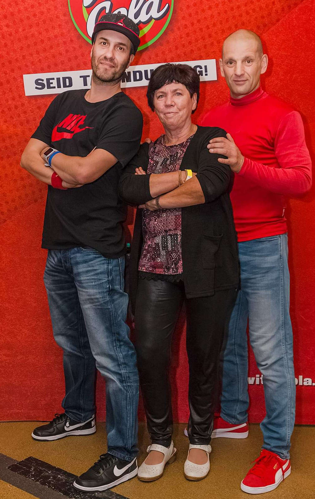 Petra Schuster (center) with Mischa "Navo" Lorkowski (left) and Heiko "Hahny" Hahnewald (right)